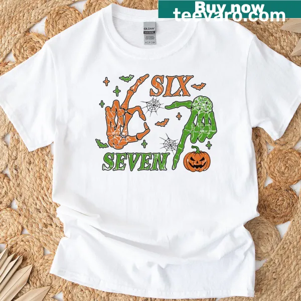Humorous Halloween t-shirt featuring a cartoon skeleton hand design.