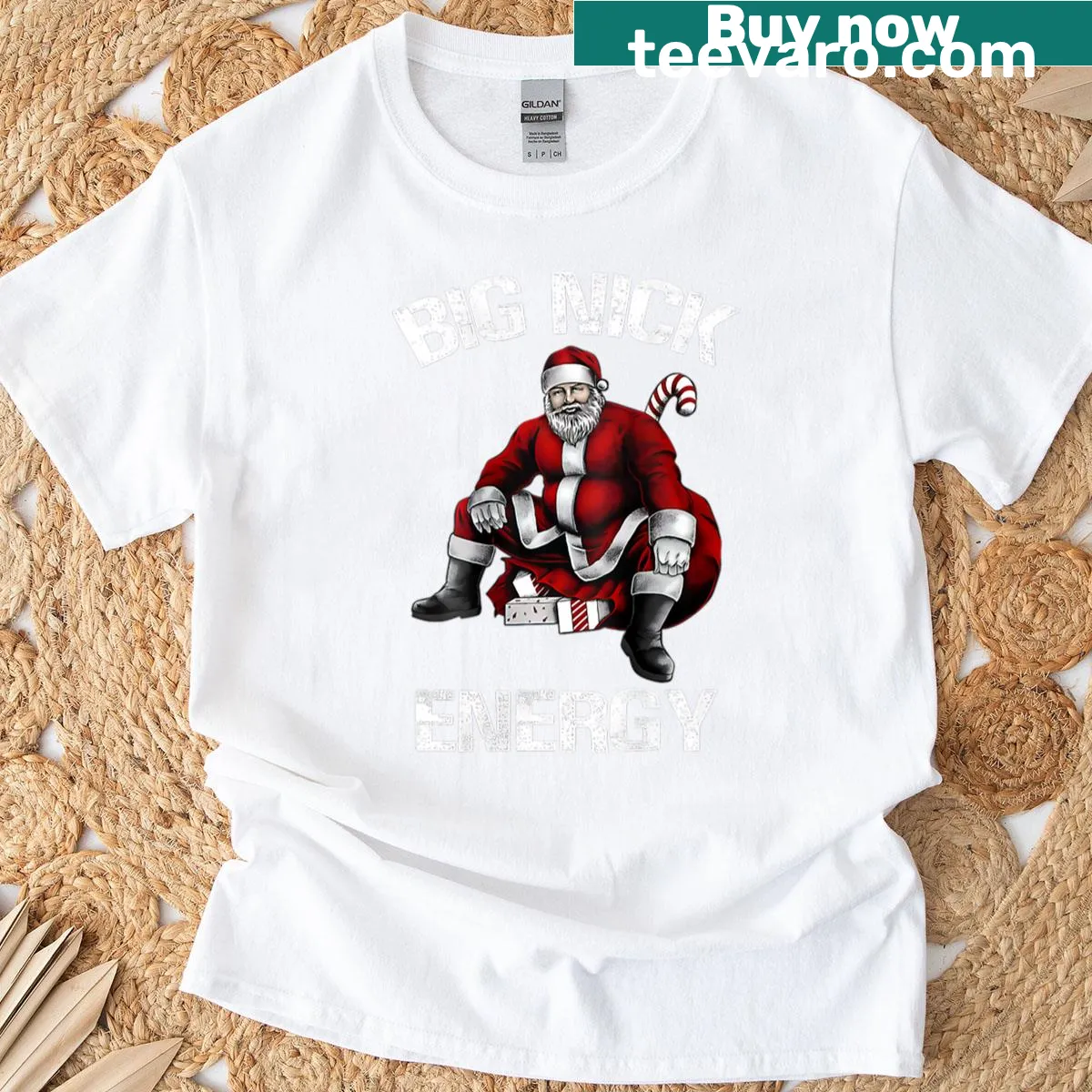 Funny Christmas T-shirt with 'Big Nick Energy' text — on a men's t-shirt