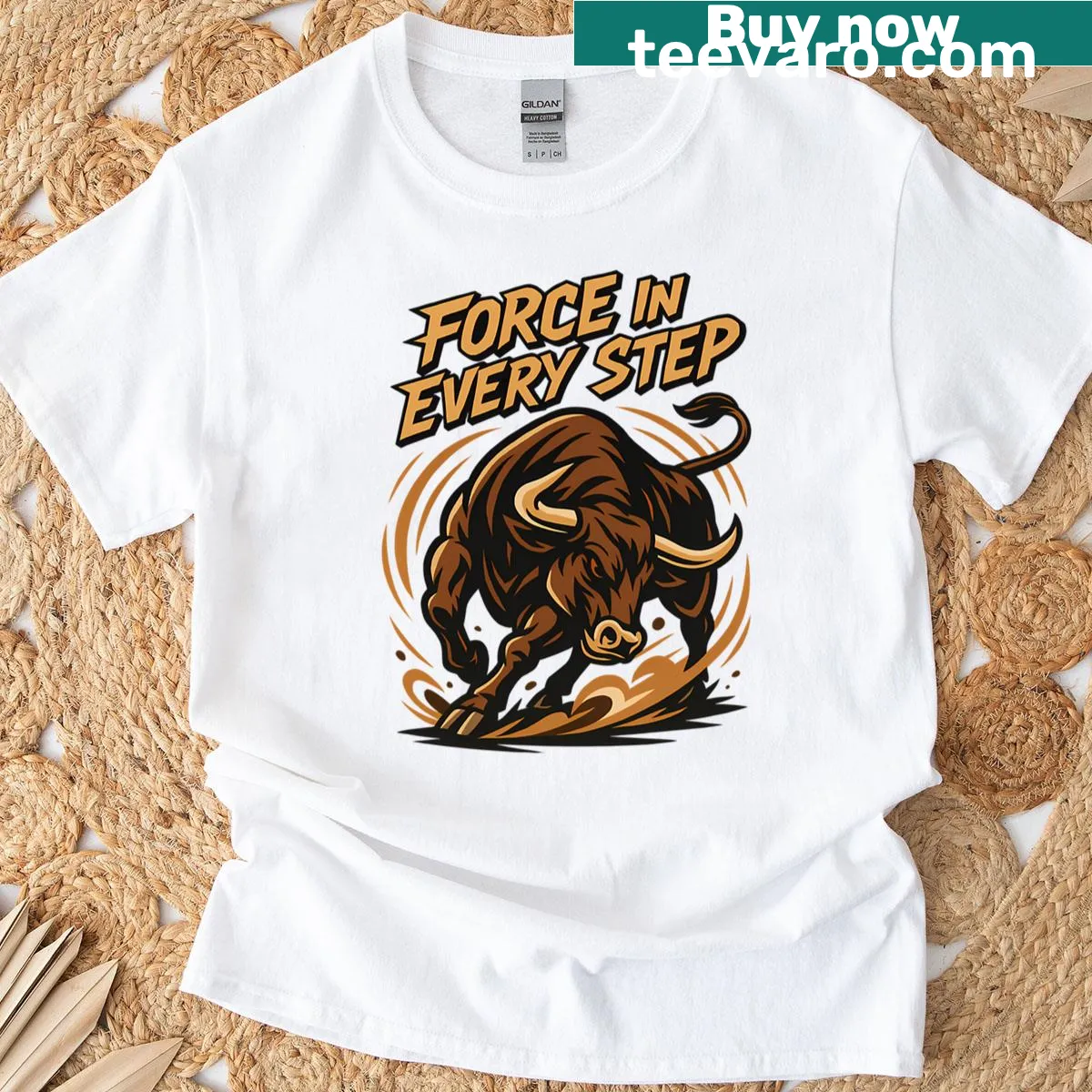 T-shirt featuring a bold charging bull graphic with dust trails — on a men's t-shirt