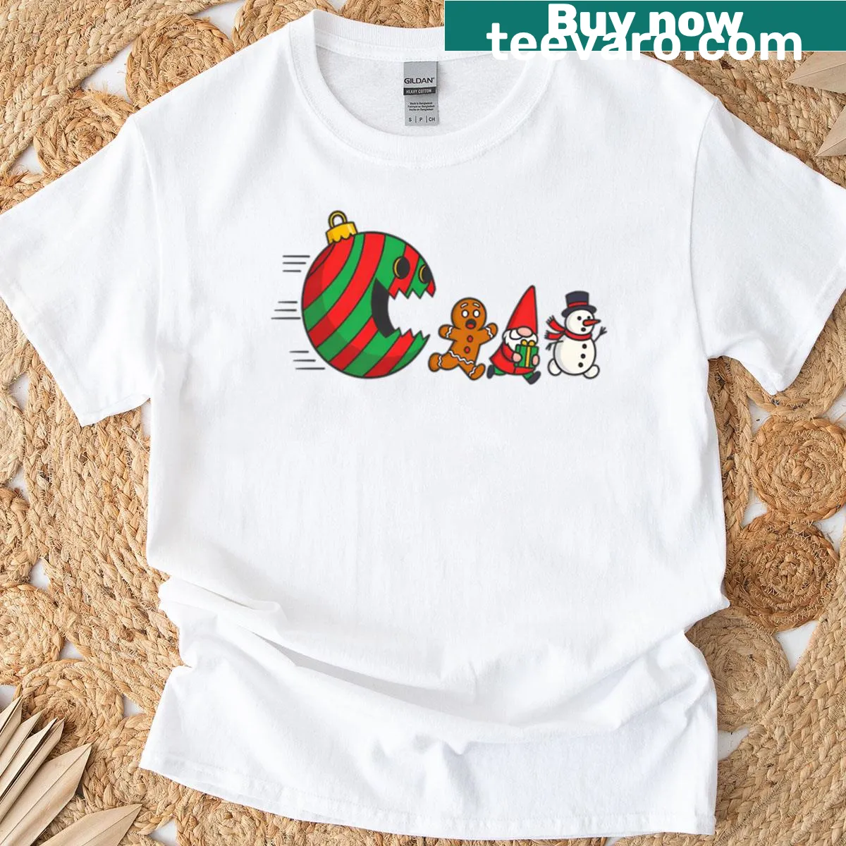 Cartoon gnome chasing a gingerbread man amidst ornaments on a t-shirt — on a men's t-shirt