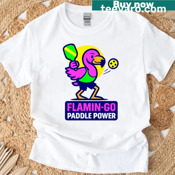 Playful flamingo design holding a paddle on pickleball-themed t-shirt