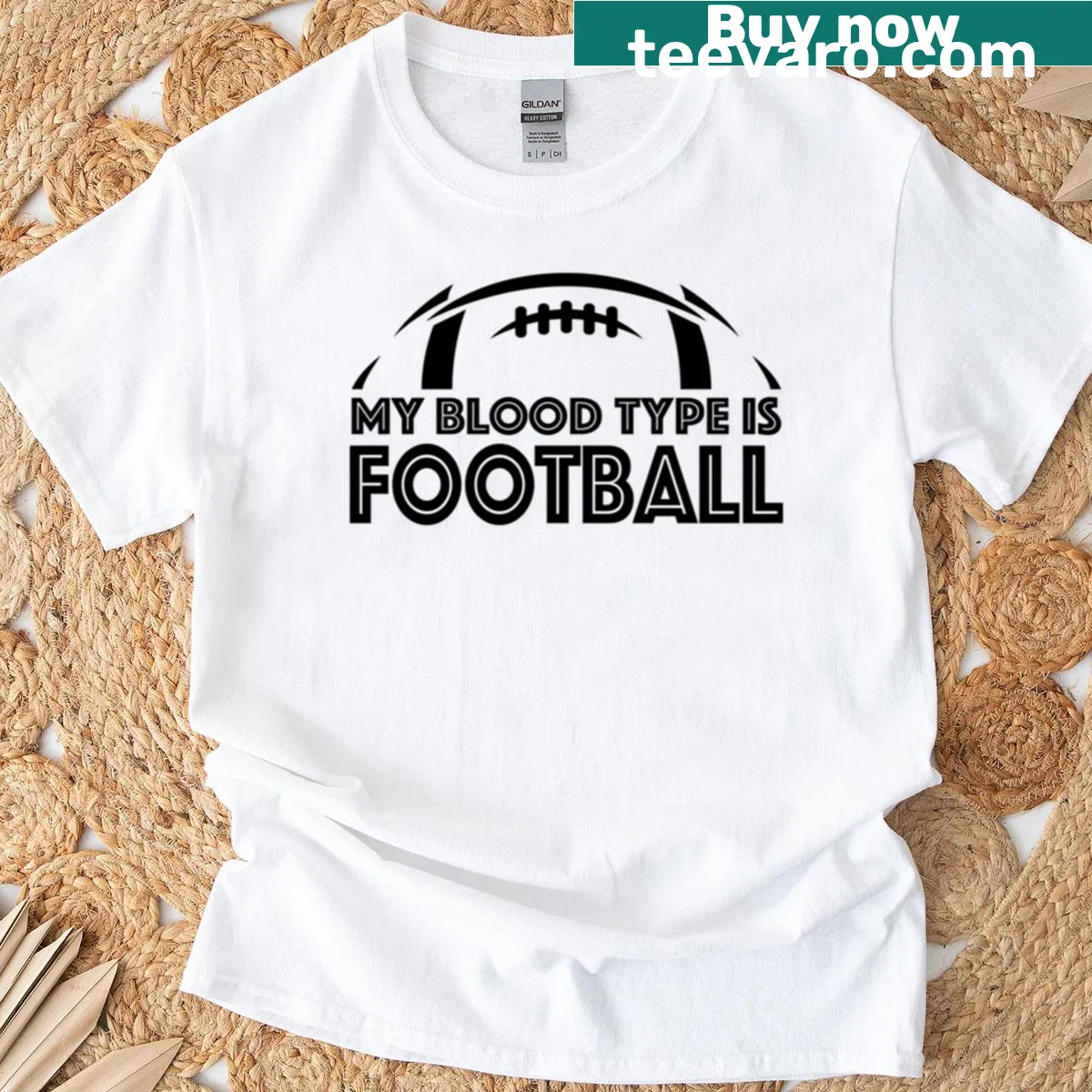 Minimalist football-themed t-shirt with 'My Blood Type is Football' text — on a men's t-shirt