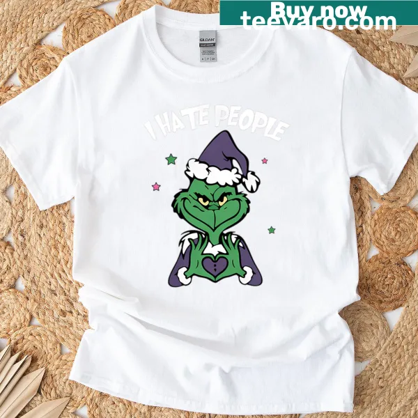 Grinch Baltimore Ravens shirt with humorous Christmas football graphics