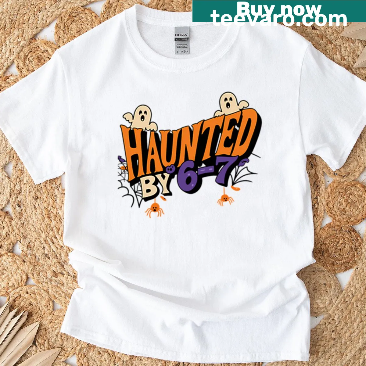 Halloween T-shirt with ghosts and spiders design — on a men's t-shirt