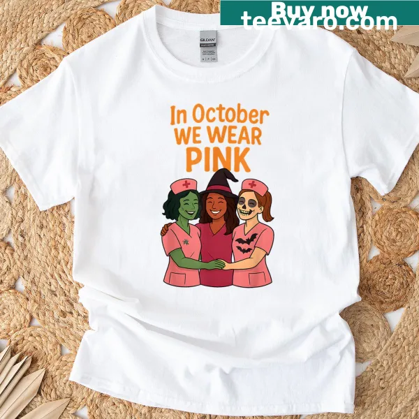 Halloween t-shirt with ghost graphic and 'In October We Wear Pink' text.