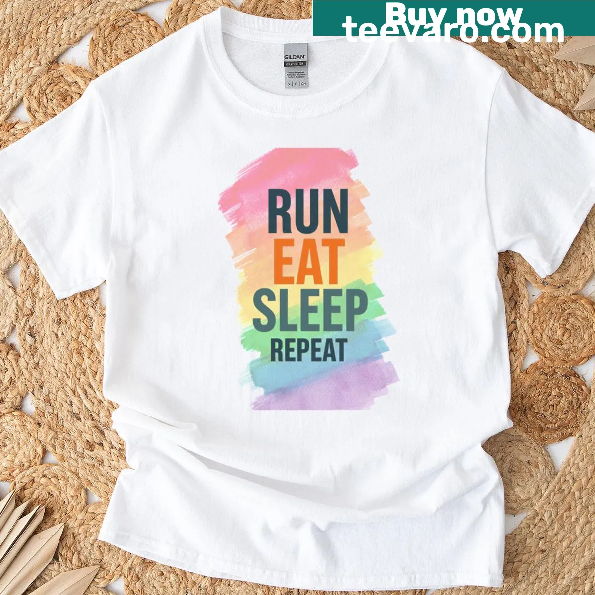 Motivational rainbow design T-shirt with 'Run Eat Sleep Repeat' — on a men's t-shirt