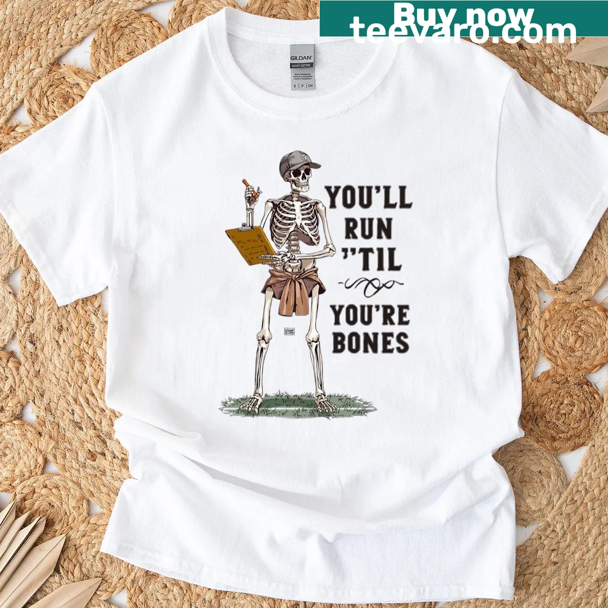 Vintage-style T-shirt featuring a skeleton coach with a game plan — on a men's t-shirt