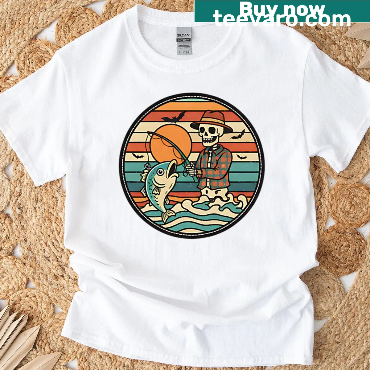 Funny t-shirt with a skeleton fishing at sunset for Halloween — on a men's t-shirt