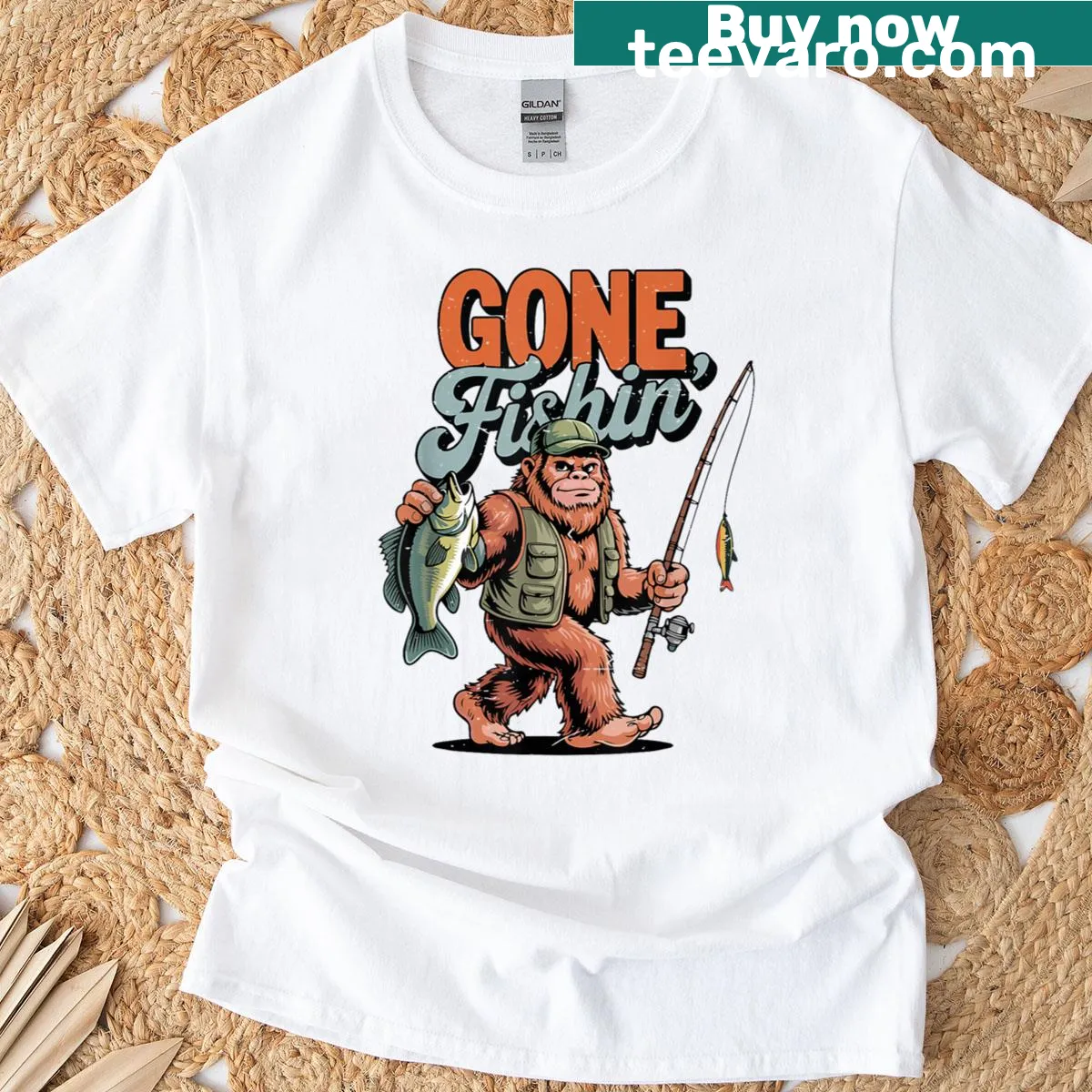 Cartoon Bigfoot fishing design on kids' t-shirt — on a men's t-shirt