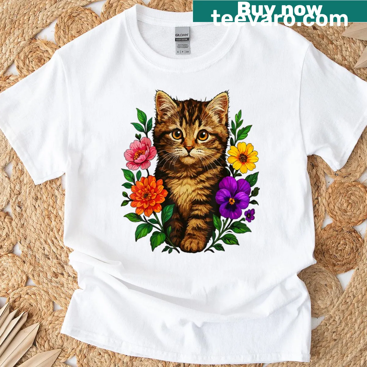 Cute kitten surrounded by flowers illustrated on a t-shirt — on a men's t-shirt