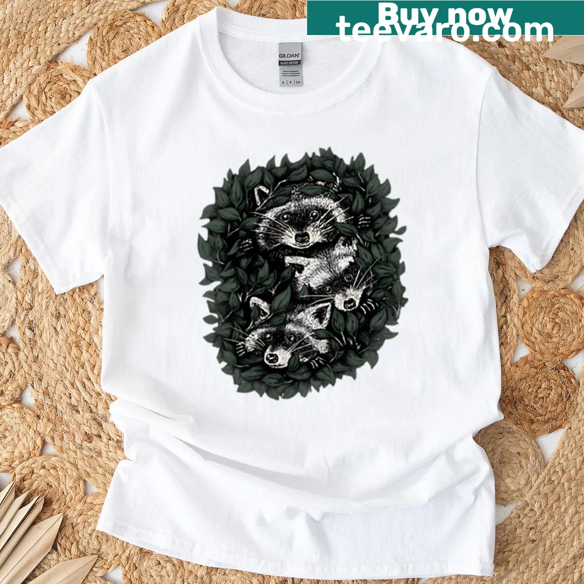 Cute illustration of three raccoons playing in leaves on a T-shirt — on a men's t-shirt