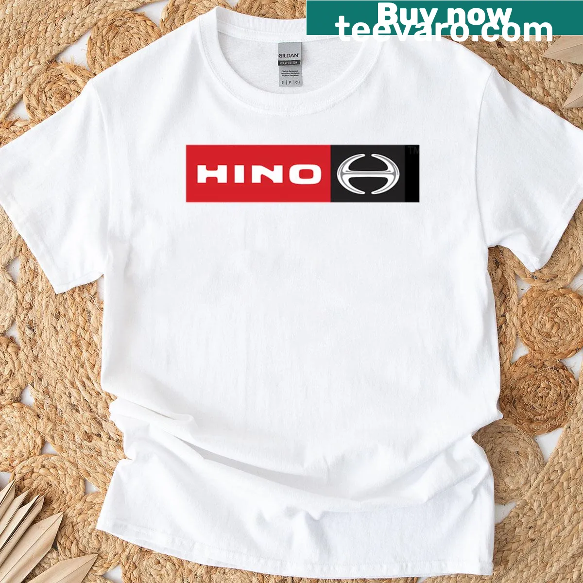 Minimalist Hino logo graphic T-shirt — on a men's t-shirt