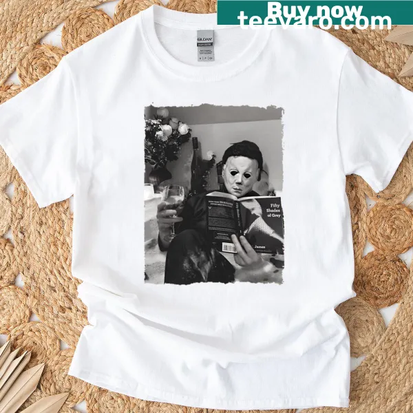 Funny horror-themed t-shirt with graphic of a bookworm and horror movie elements