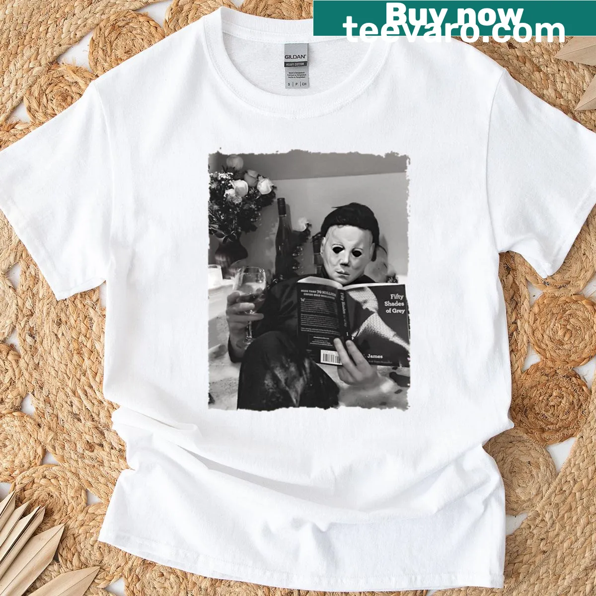 Funny horror-themed t-shirt with graphic of a bookworm and horror movie elements — on a men's t-shirt