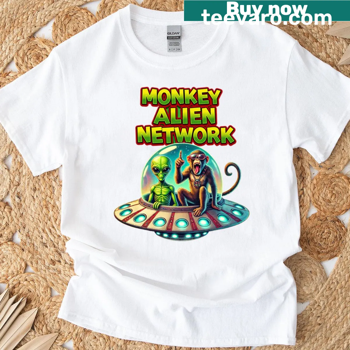 Comical T-shirt featuring a monkey and alien design — on a men's t-shirt