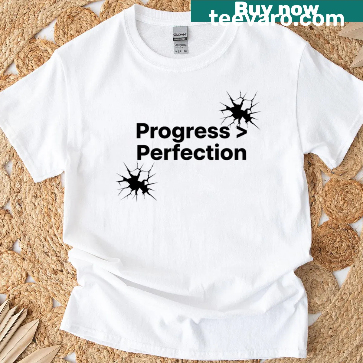 Minimalist design featuring the phrase 'Progress Over Perfection' — on a men's t-shirt