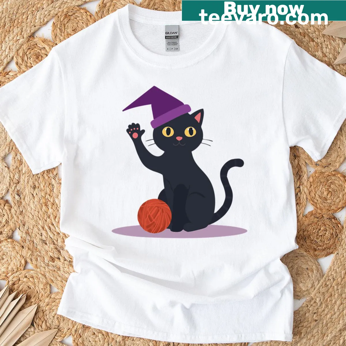 Adorable Halloween cat graphic with witchy elements — on a men's t-shirt