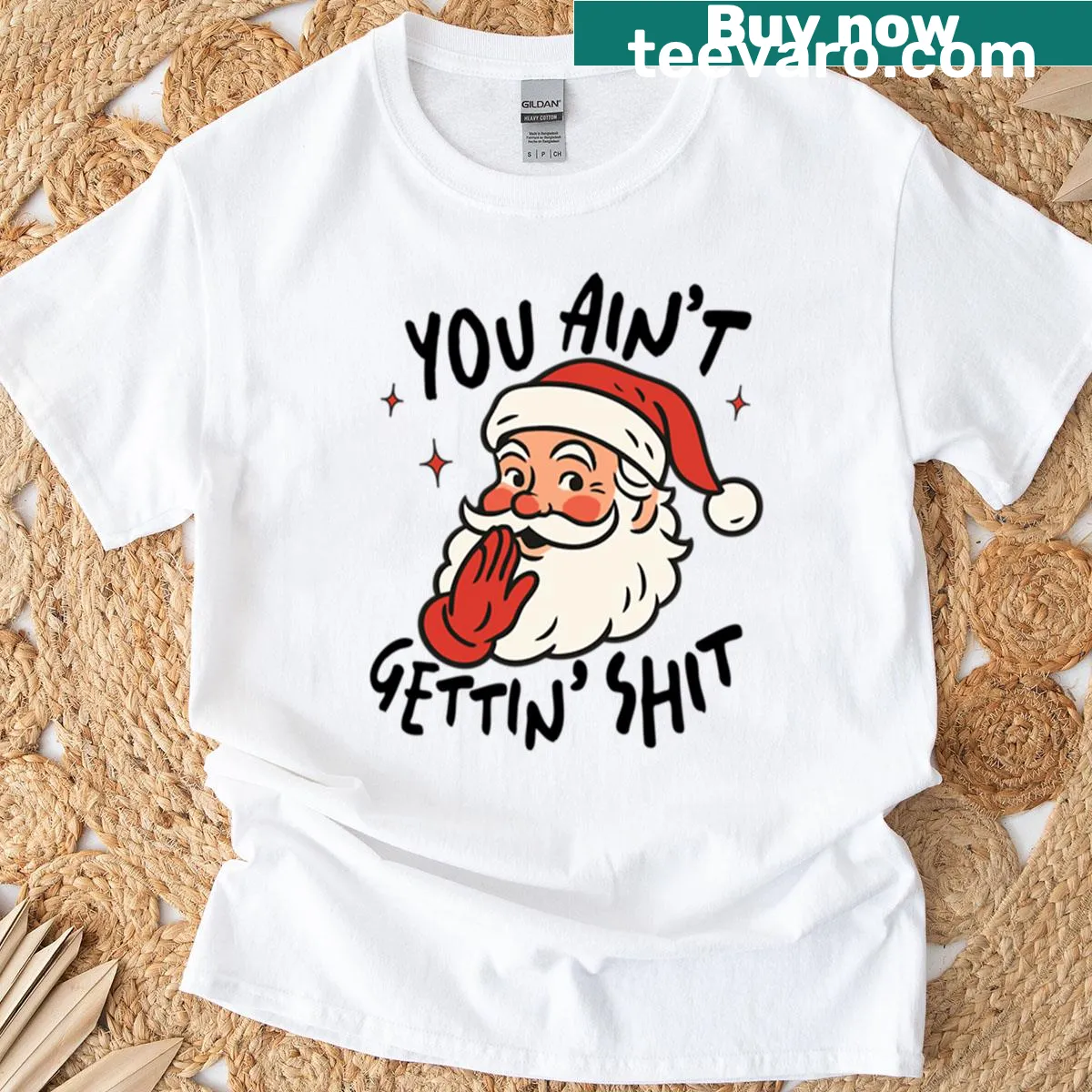 Funny whispering Santa t-shirt with humorous text — on a men's t-shirt