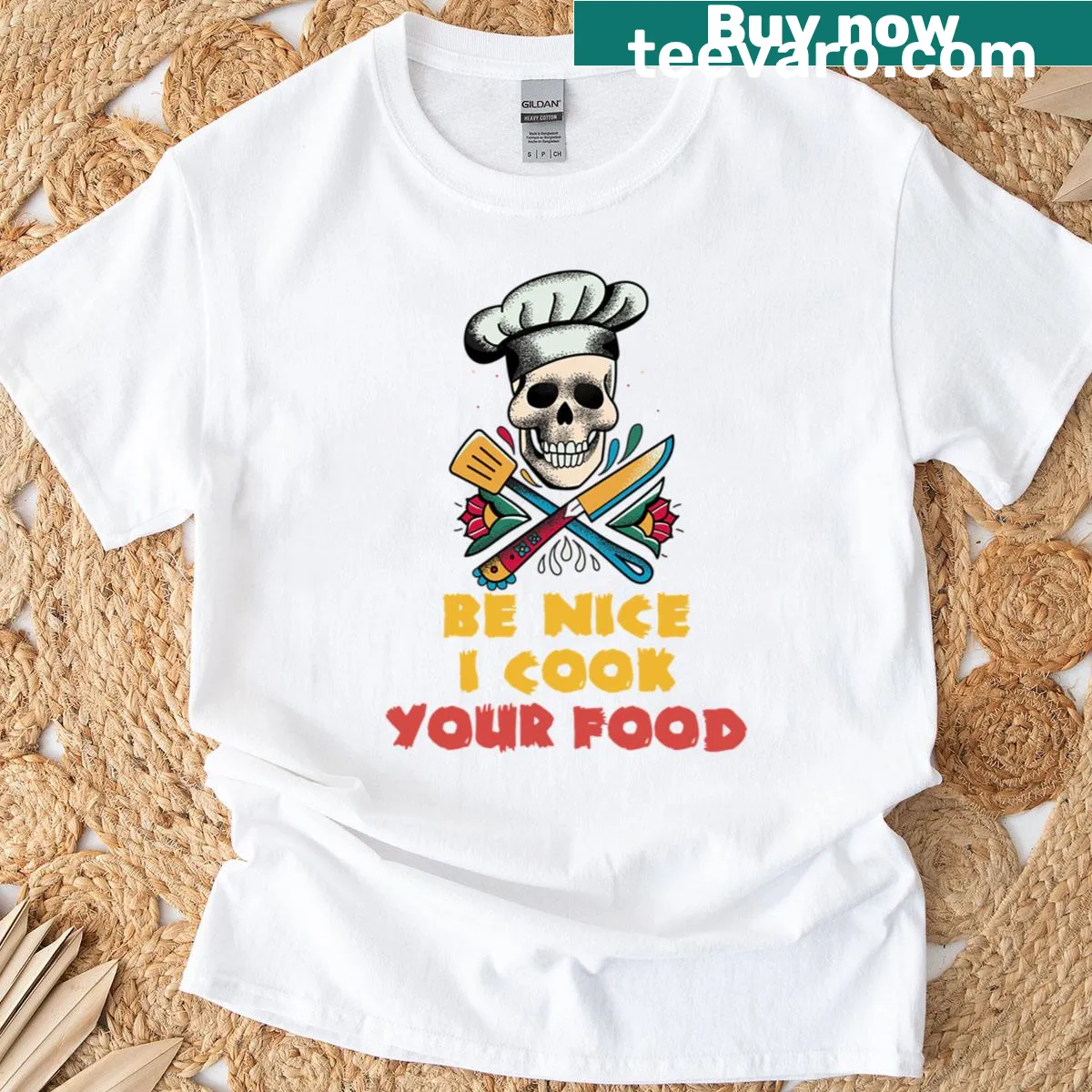 T-shirt with a skull chef illustration and text 'Be Nice I Cook Your Food' — on a men's t-shirt