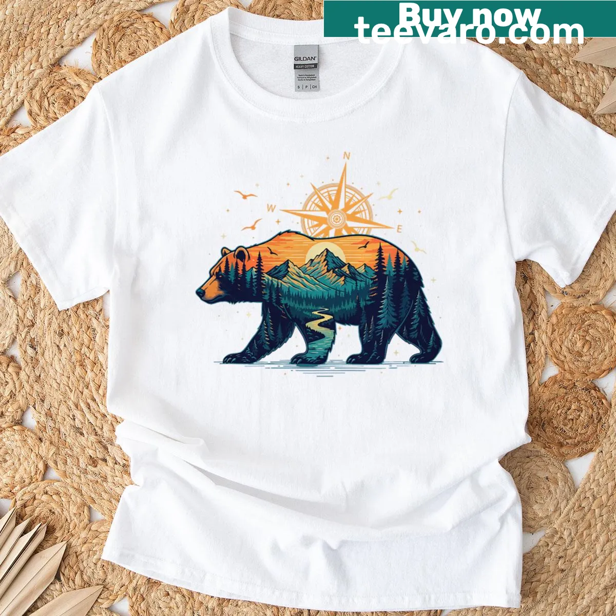 Illustration of bear and compass on an outdoor-themed t-shirt — on a men's t-shirt