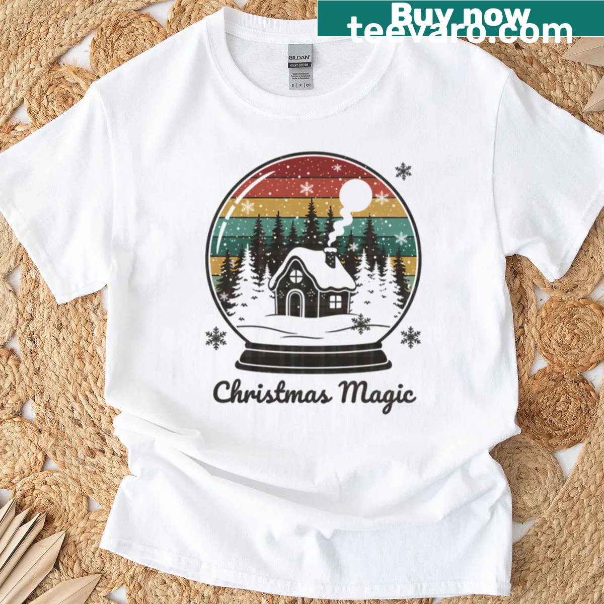 Vintage snow globe design featuring a cozy cabin for Christmas. — on a men's t-shirt