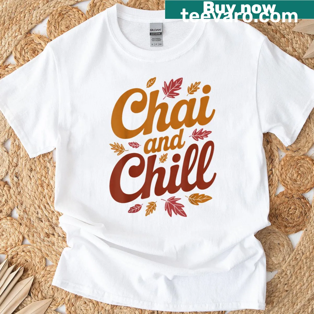 Cute autumn tea drinker T-shirt with fall leaves and chai design — on a men's t-shirt