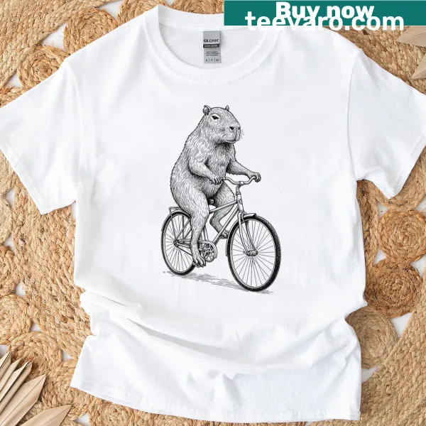 Vintage-style T-shirt with a capybara riding a bicycle