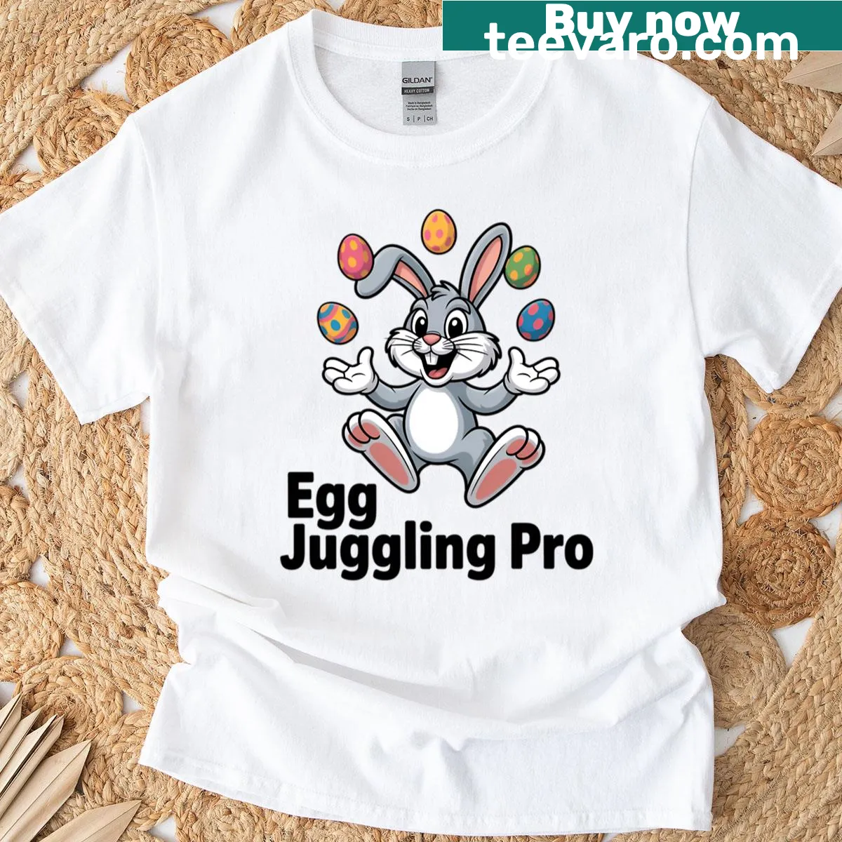 Whimsical Easter Bunny juggling eggs on a playful T-shirt — on a men's t-shirt
