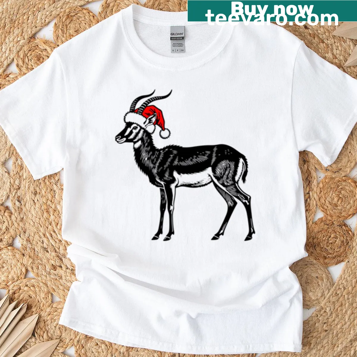Silhouette of an antelope wearing a Santa hat on a T-shirt. — on a men's t-shirt