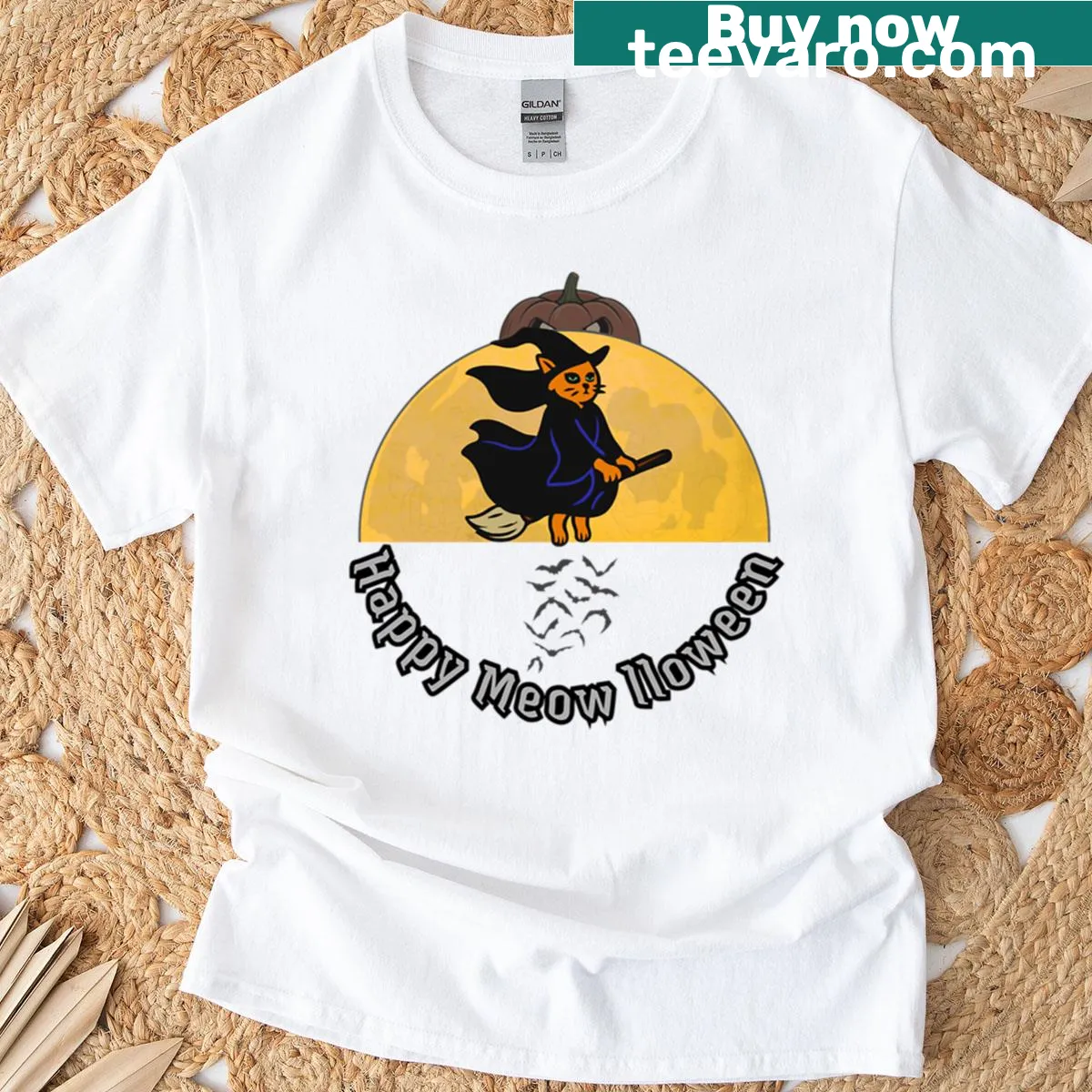 Whimsical cat on a broomstick against a full moon on a T-shirt. — on a men's t-shirt