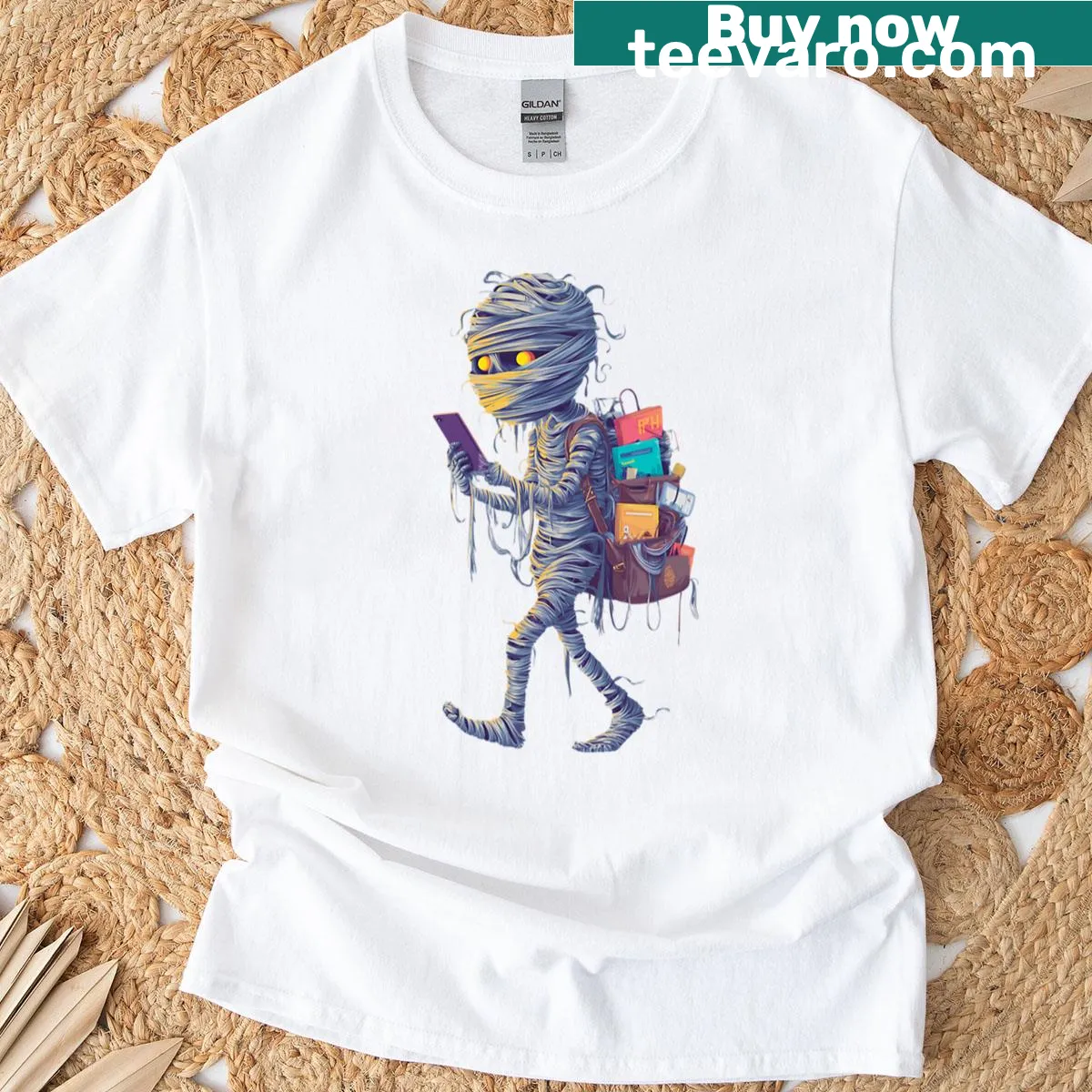 Funny t-shirt with a mummy carrying a phone and backpack — on a men's t-shirt