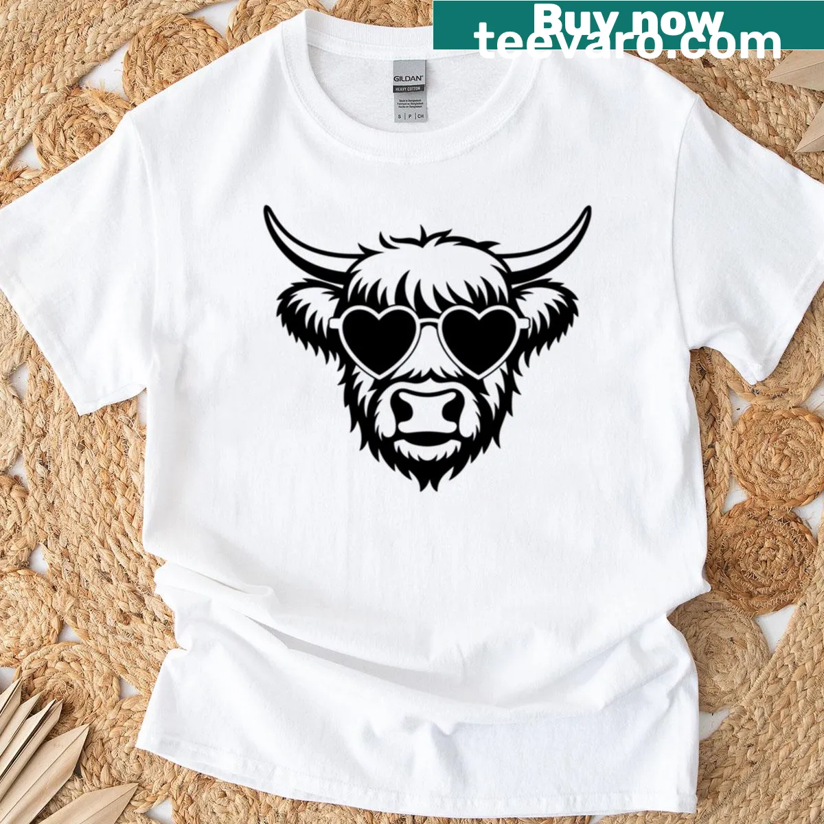 Illustrated t-shirt featuring a Highland cow with heart-shaped glasses — on a men's t-shirt