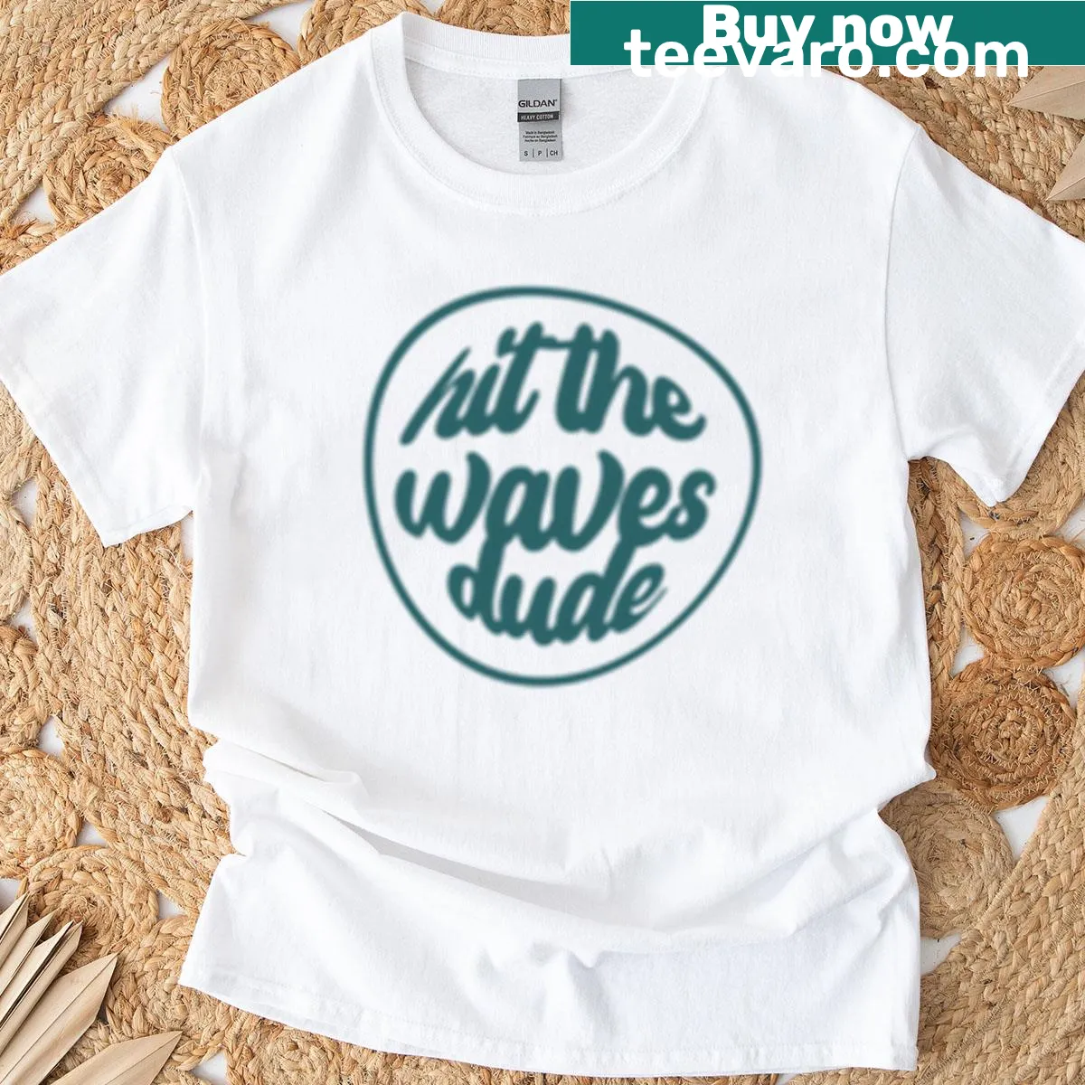 Vintage surf graphic t-shirt with 'Hit The Waves Dude' text — on a men's t-shirt