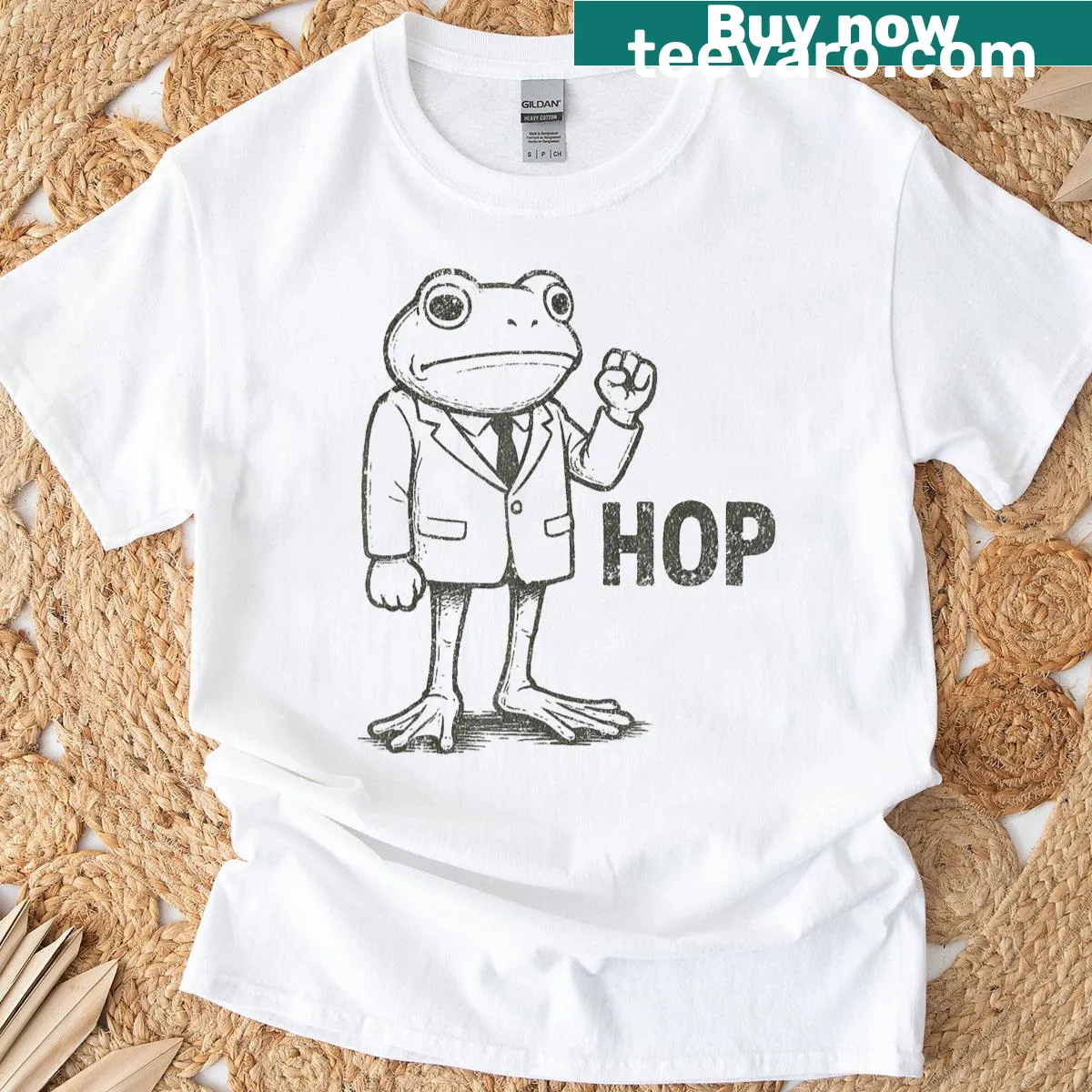Illustrative T-shirt featuring a frog activism graphic — on a men's t-shirt