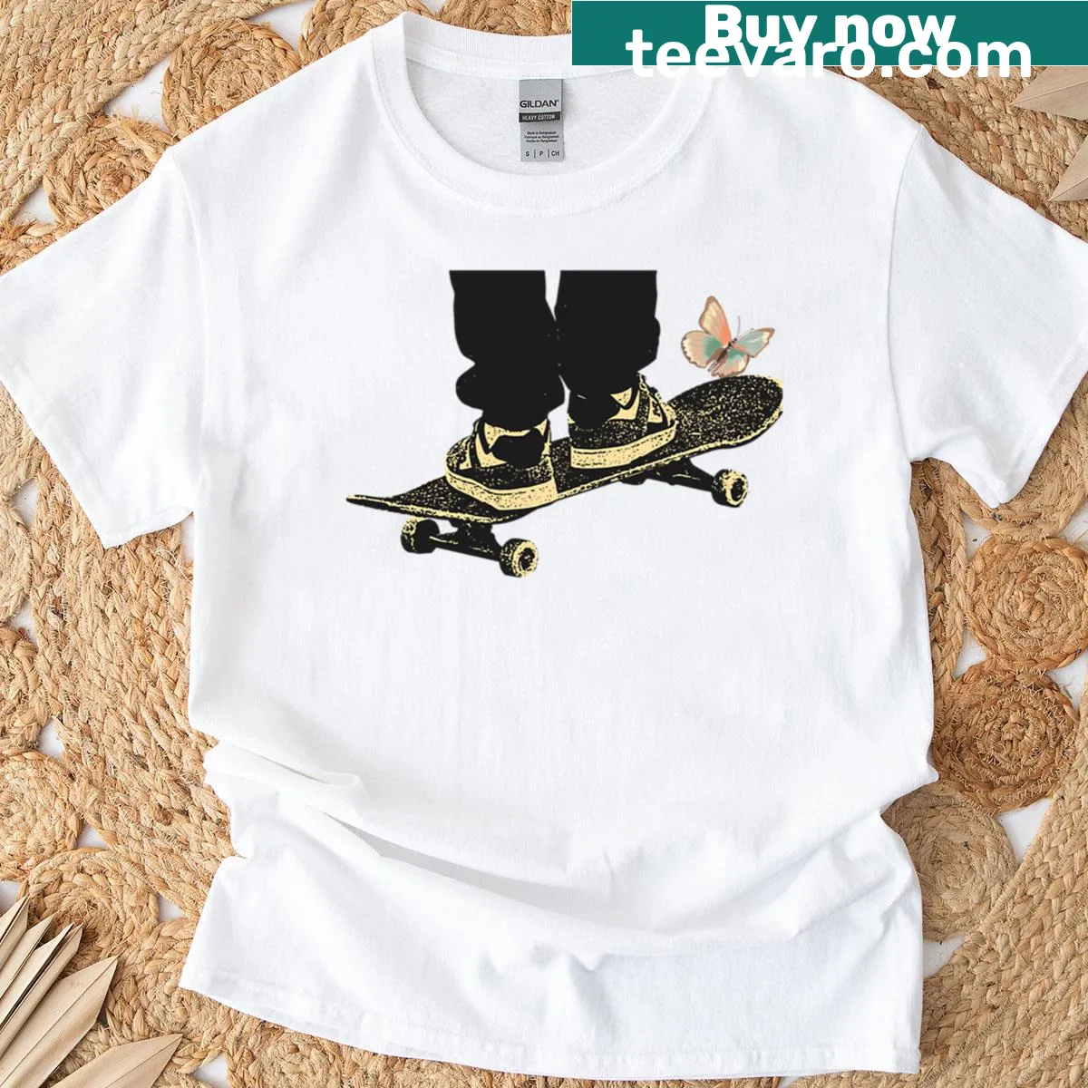 Illustrative skateboarding butterflies graphic on a t-shirt — on a men's t-shirt