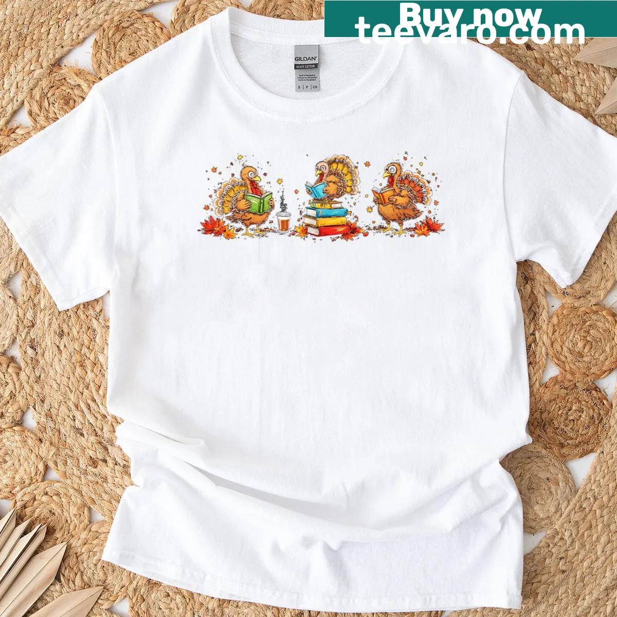 Thanksgiving-themed T-shirt with a turkey reading books and a festive design. — on a men's t-shirt