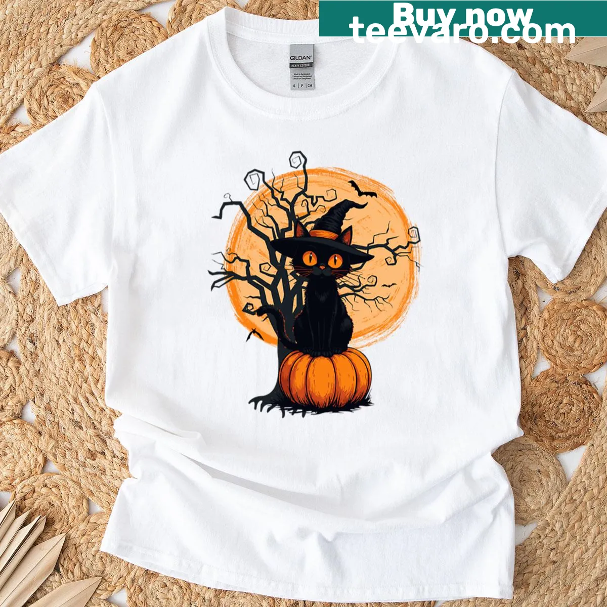 Whimsical T-shirt featuring a cat on a pumpkin illustration — on a men's t-shirt