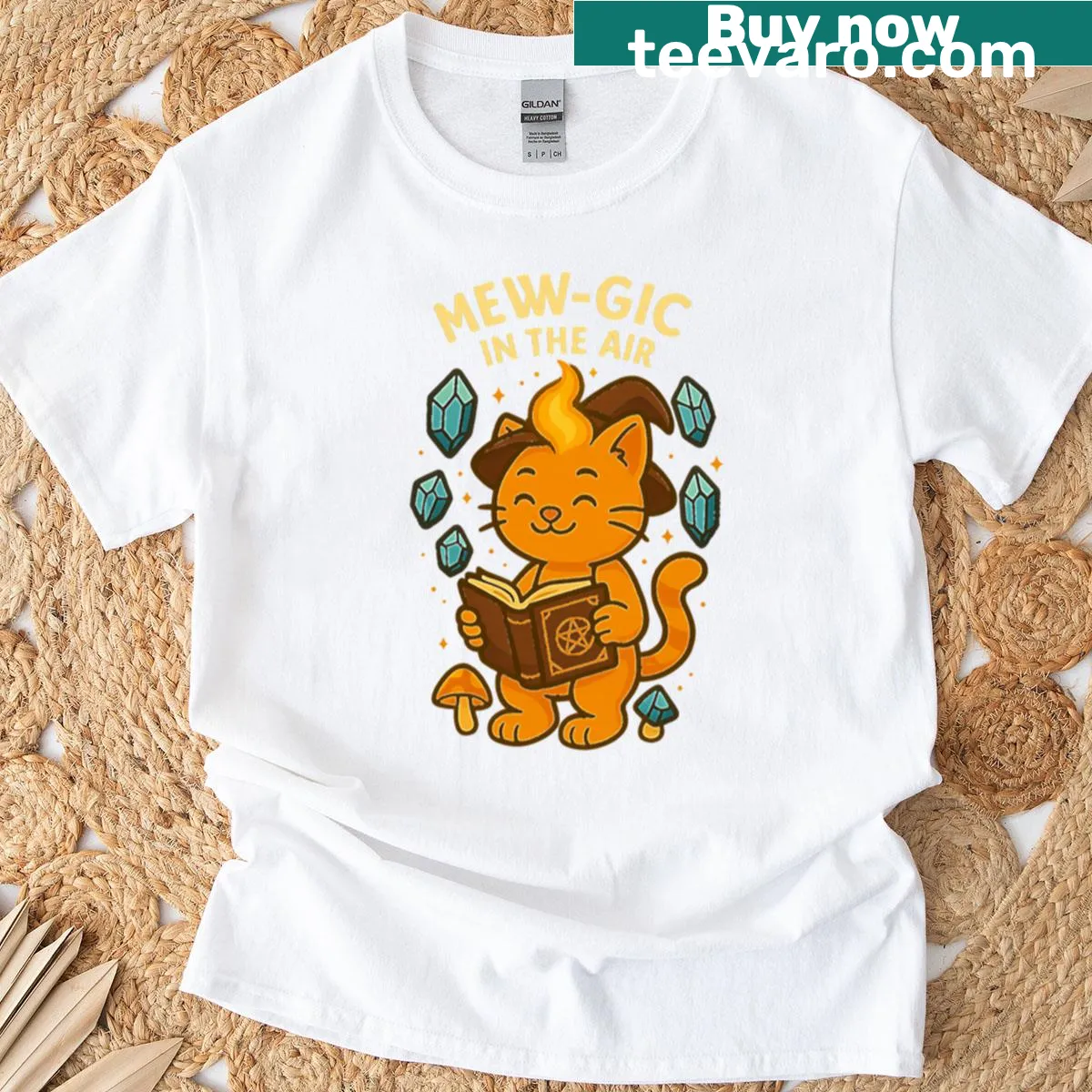 Cute orange cat with crystals and spellbook in Halloween illustration — on a men's t-shirt