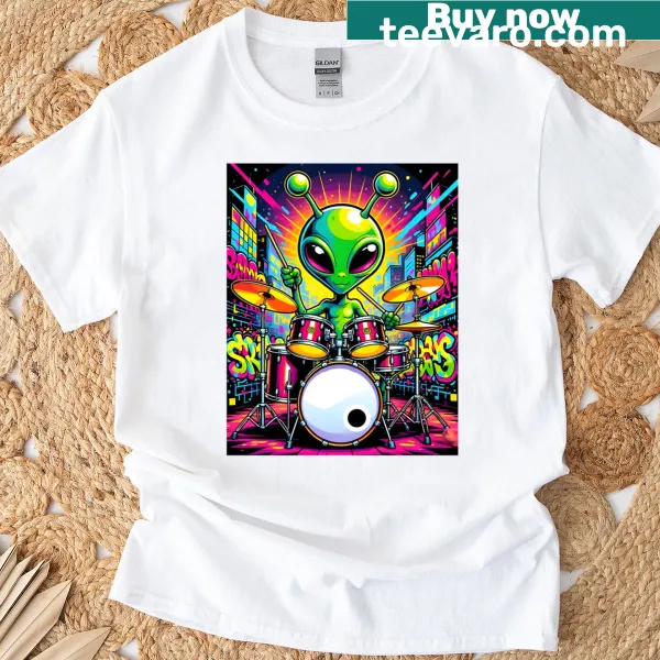 Playful cartoon of an alien drummer on a fun T-shirt.