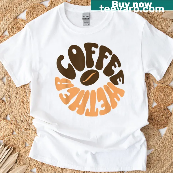 Cozy fall-themed T-shirt with coffee illustrations and retro text design.