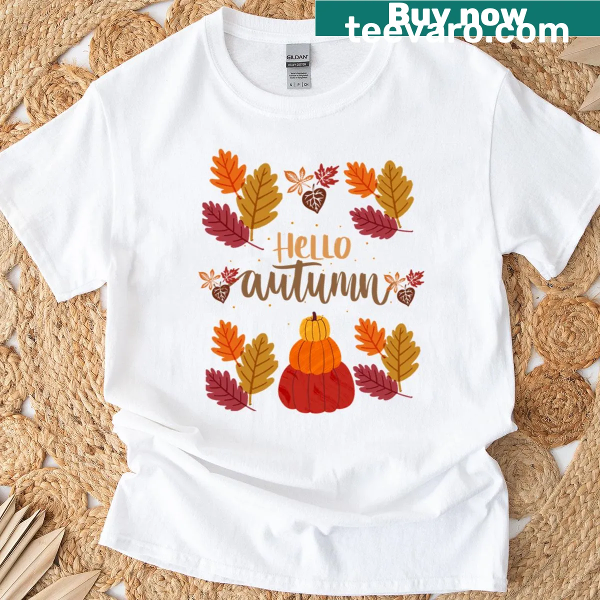 Cozy autumn-themed T-shirt with fall leaves and pumpkin stack design — on a men's t-shirt