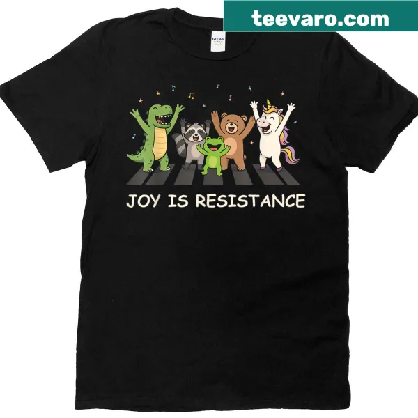 Inspirational t-shirt with frog graphic and text 'Joy Is Resistance'.