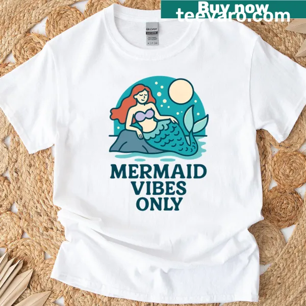 Whimsical mermaid lounging on a rock under the moonlight t-shirt