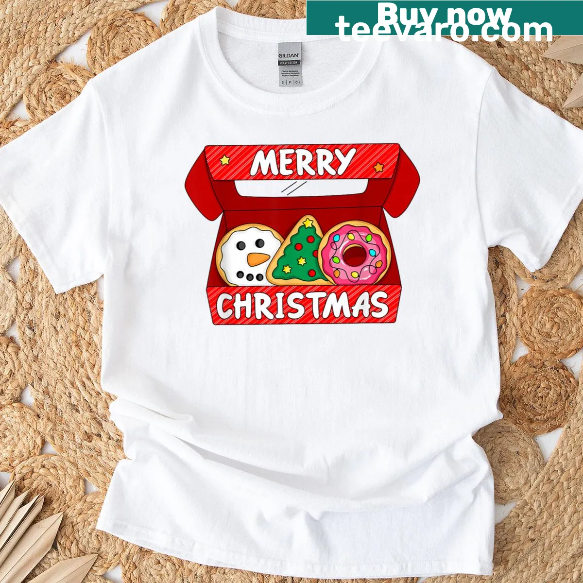 Whimsical Christmas T-shirt with snowman, tree, and donuts illustration — on a men's t-shirt