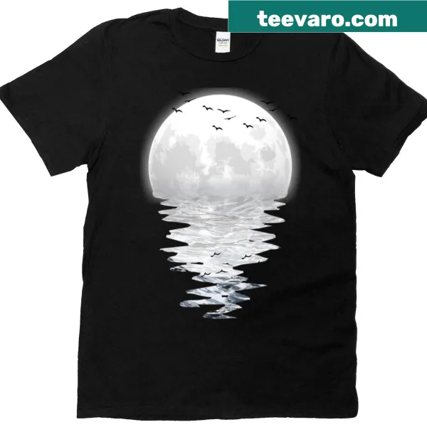 Illustrated graphic of a moon and musical notes on a shirt