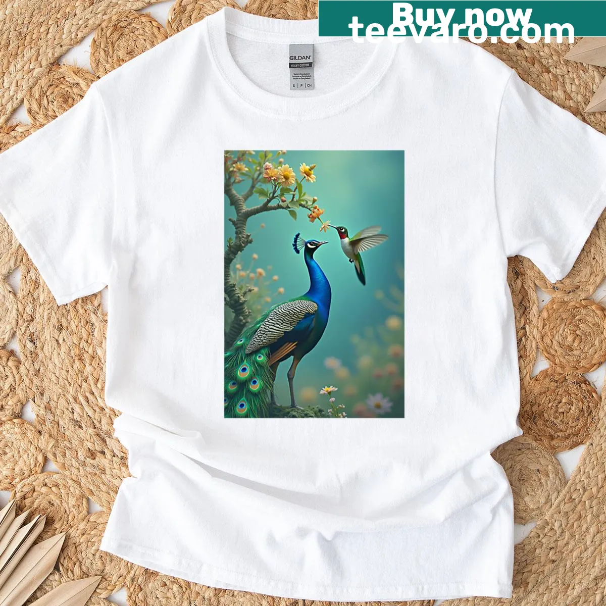 Illustrated t-shirt featuring a peacock and hummingbird — on a men's t-shirt