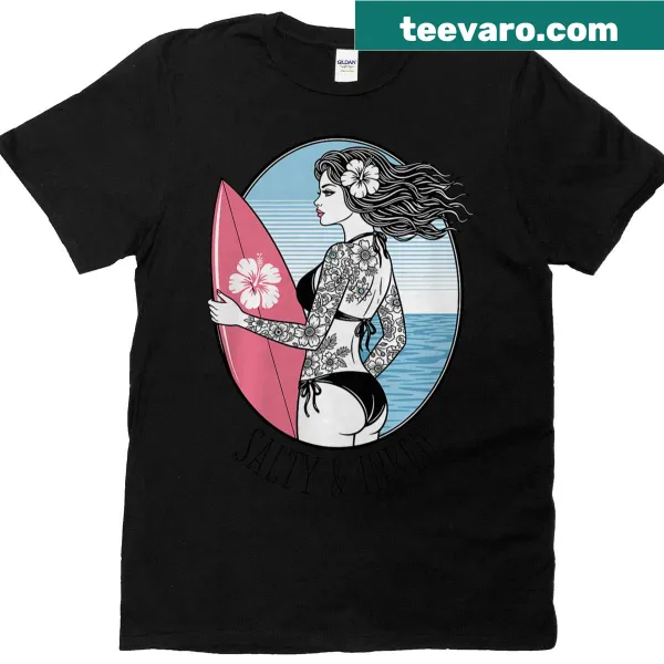 Vintage-style t-shirt featuring a tattooed surfer girl in pin-up art