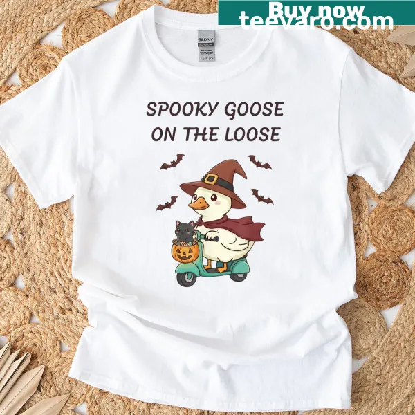Funny Halloween t-shirt featuring a cartoon goose in a witch hat