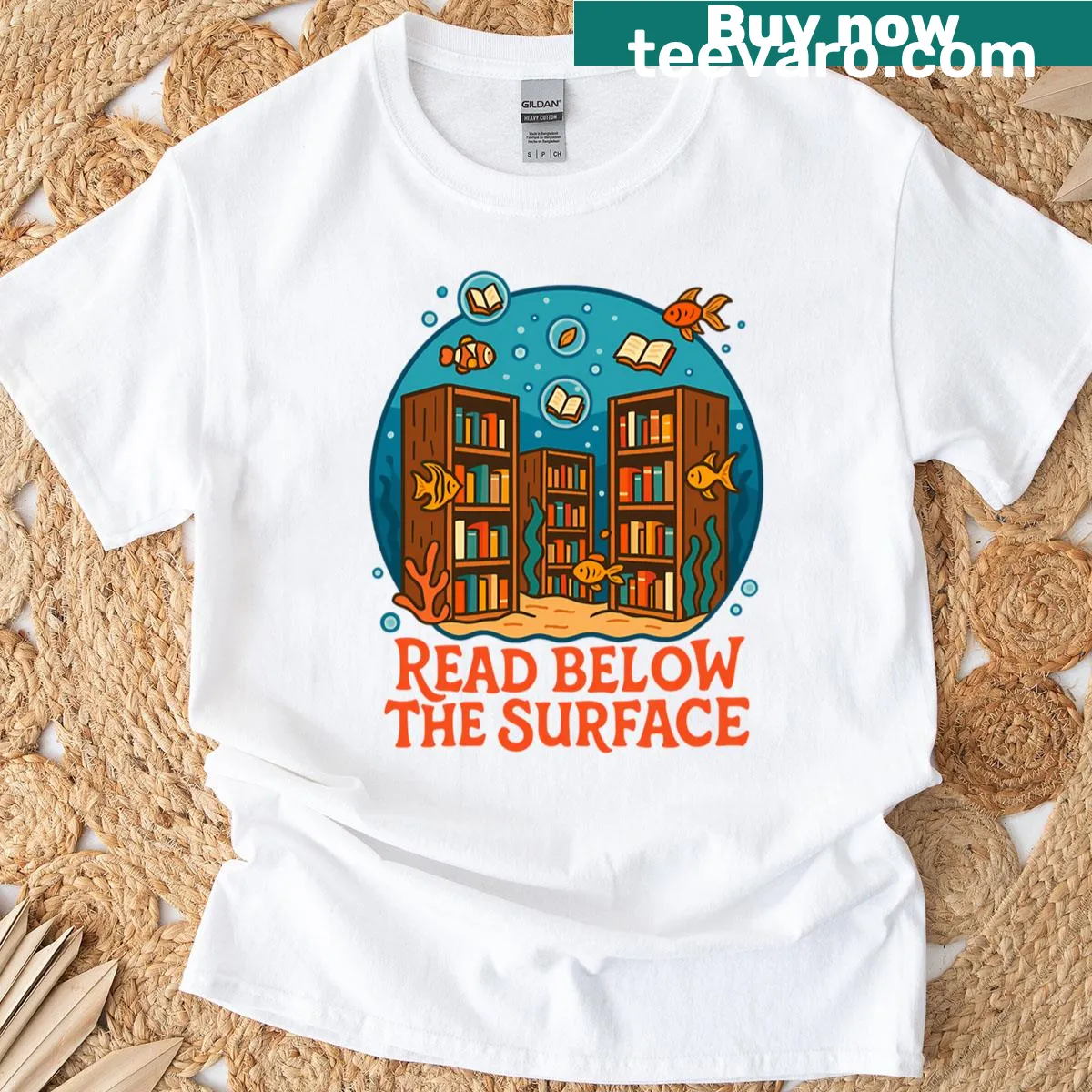 Underwater library T-shirt with floating books and fish illustration — on a men's t-shirt