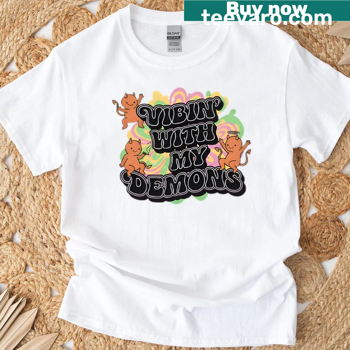 Playful T-shirt featuring cartoonish demons with a fun vibe — on a men's t-shirt